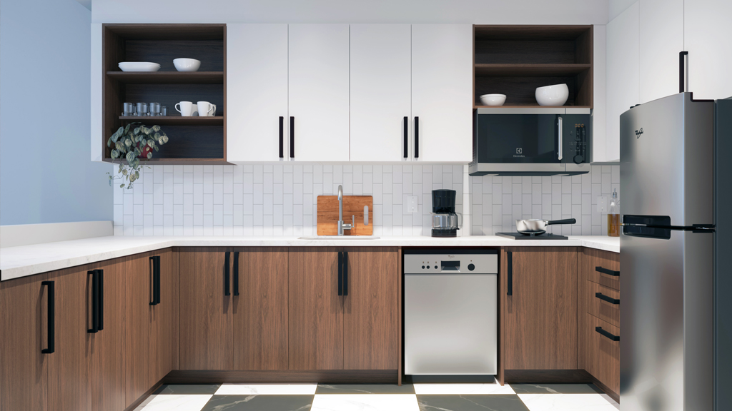 Kitchenette with white cabinets above and imitation brown wood cabinets below, with long black cabinet handles.